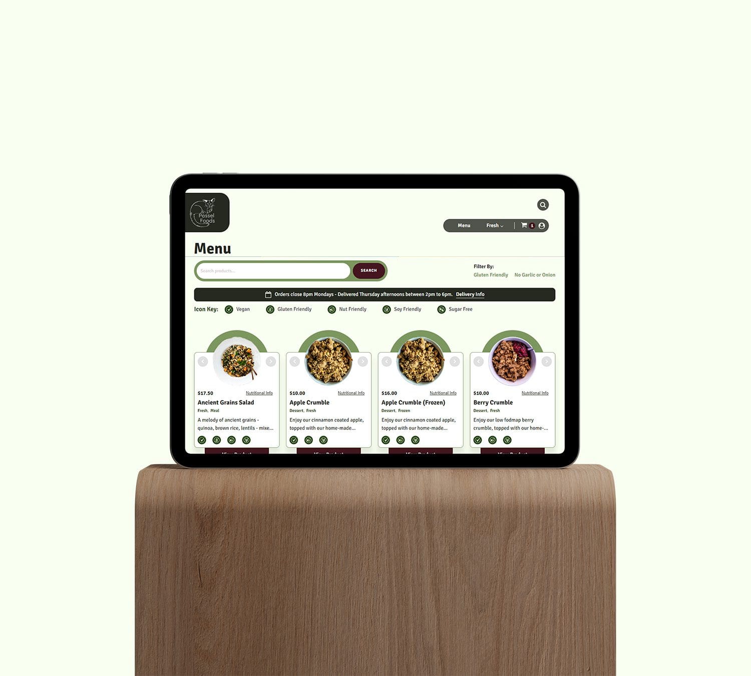 Passel Foods website shown on ipad on a wood plinth